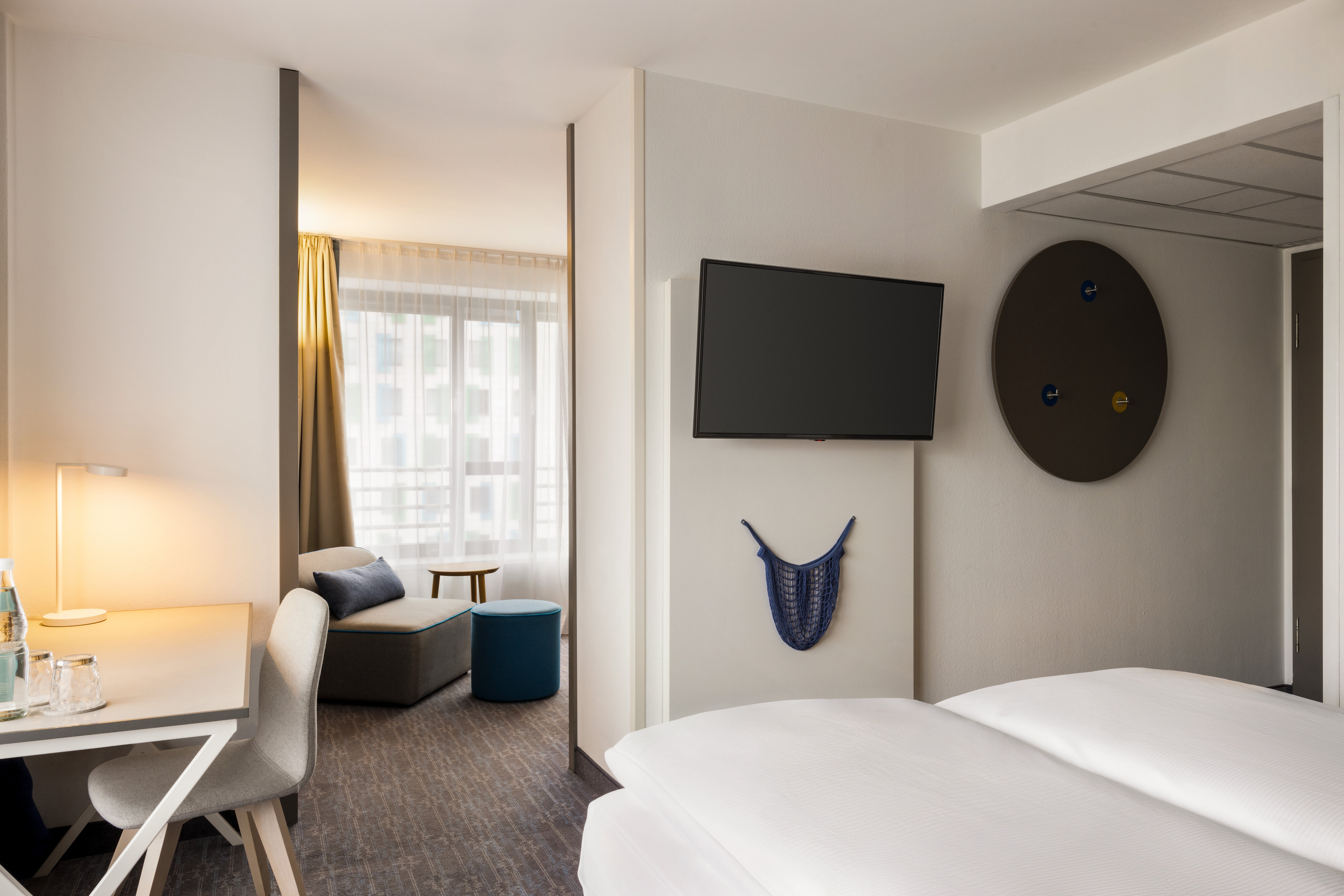 Vienna_House_Easy_by_Wyndham_Berlin_Prenzlauer_Berg_Lounge_Family_Zimmer